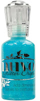 http://kolorowyjarmark.pl/pl/p/Preparat-Nuvo-Crystal-Drops-Glitter-1.1oz-Aquatic-Mist/7941