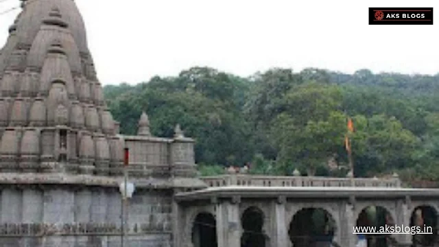 Pilgrims meditating peacefully in the tranquil atmosphere of Bhimashankar temple