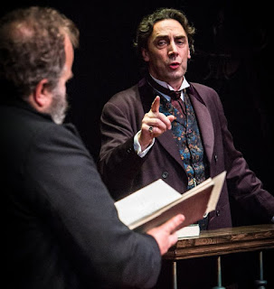Scene from the Trials of Oscar Wilde - Oscar points a finger towards the prosecution barrister while making his case