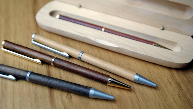 large wooden pens