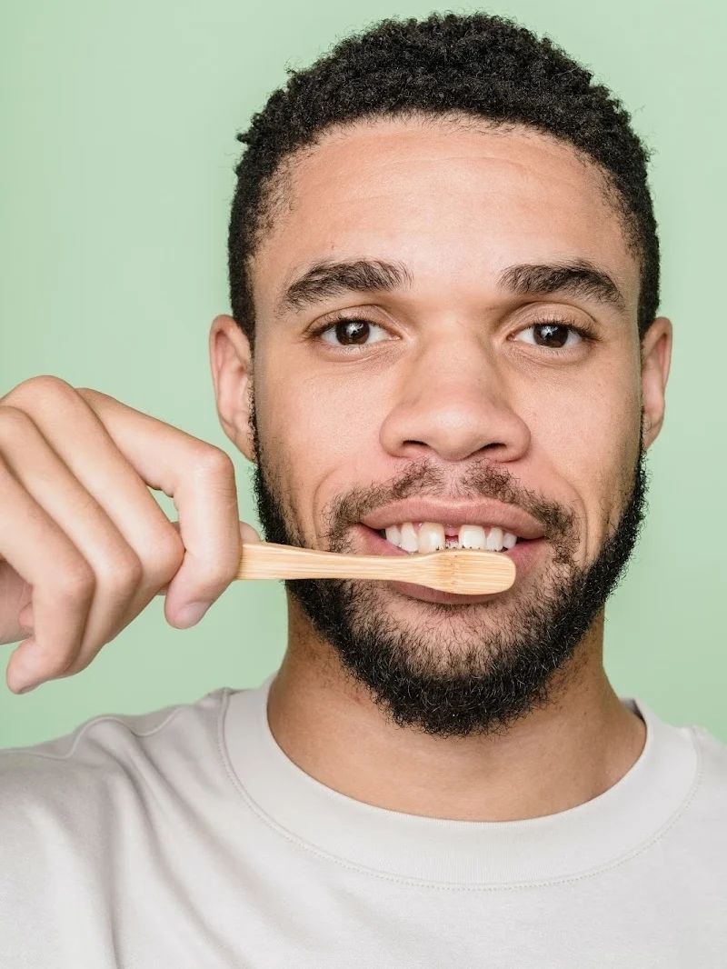 A man brushing his teeth