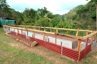 Raised garden bed made from concrete panels