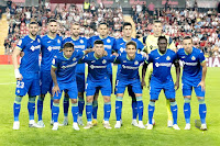 GETAFE C. F. Temporada 2022-23. Stefan Mitrović, Domingos Duarte, Borja Mayoral, Enes Ünal, Angileri, David Soria. Damián Suárez, Carles Aleñá, Luis Milla, Djené, Maksimovic. RAYO VALLECANO DE MADRID 0 GETAFE C. F. 0 Viernes 14/10/2022, 21:00 horas. Campeonato de Liga de 1ª División, jornada 9. Madrid, estadio de Vallecas: 13.076 espectadores. GOLES: no hubo.