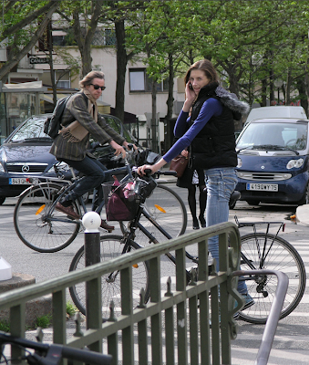 Pair of Parisian chic cyclists