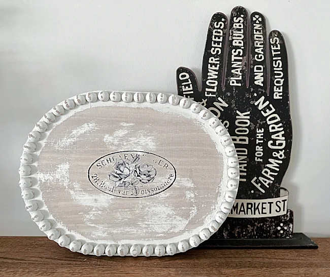 tray and hand with sign words
