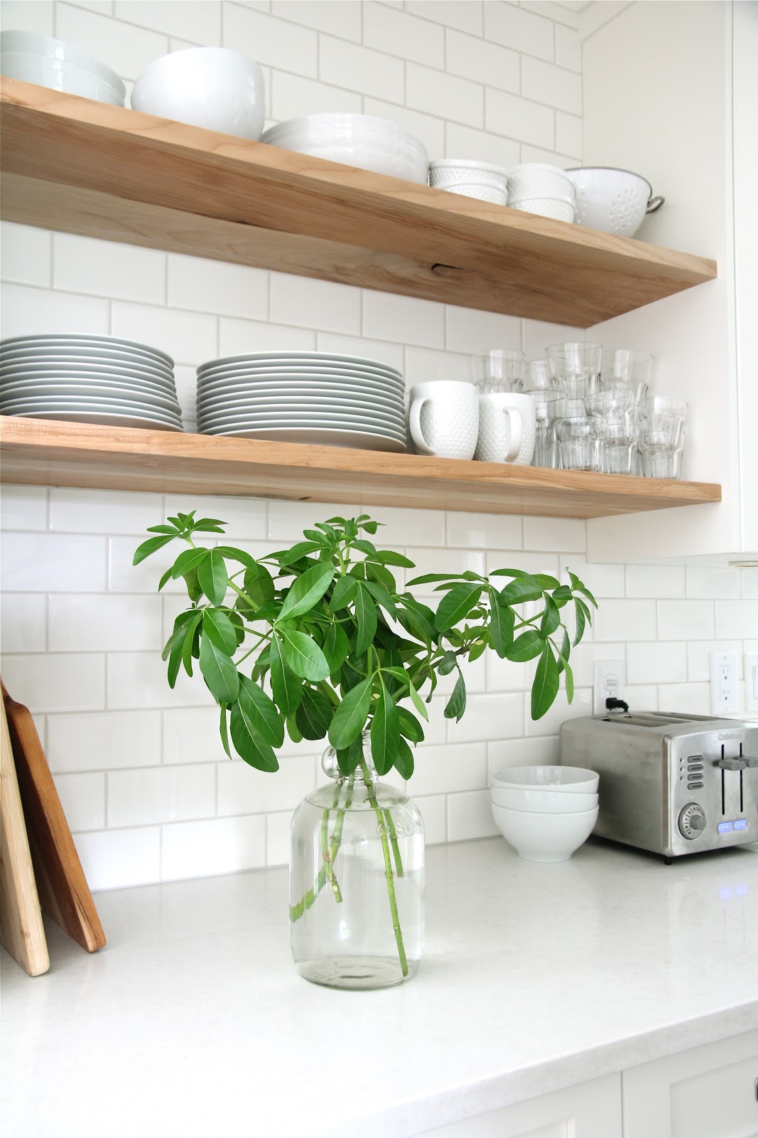 dark kitchen shelves with dark flooring