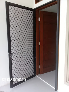 Pintu Expanda Aluminium terpasang di Rumah Bpk Maruli di Duren Sawit Jakarta Timur