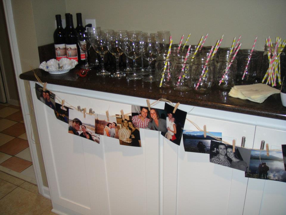 Burlap table runner with different sized mason jars as the center piece