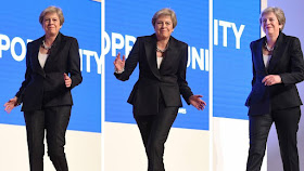 Theresa May dancing