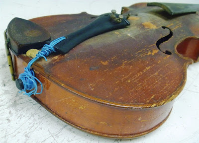 Il est préférable de faire appel à un luthier pour réparer un violon non ?