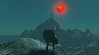 staring at the Blood Moon above Mount Lanayru, with a Queen Gibdo Shield and a Savage Lynel Bow on my back