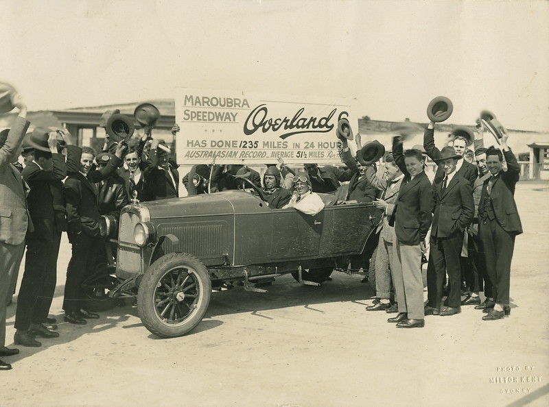 Don Harkness at wheel of Overland 6 after setting Australasian 24 hour record