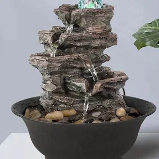 Tiny battery operated pre-made waterfalls are a perfect item to use for your water shrine in your car