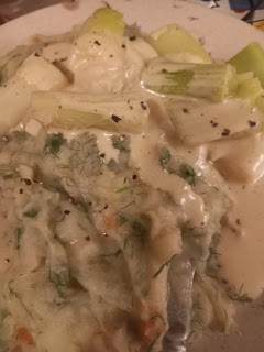 terribly messy plate of leeks with dill mash and lots of vinaigrette sauce on them