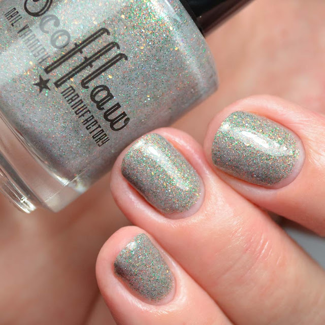 grey glitter nail polish three finger swatch