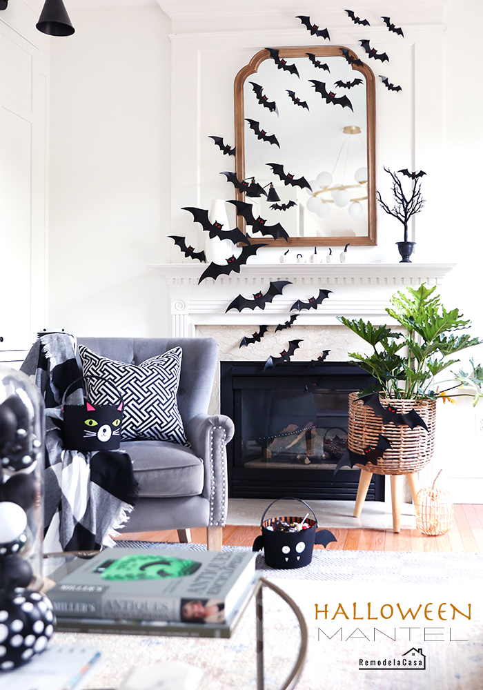 Halloween mantel with mirror and bats flying