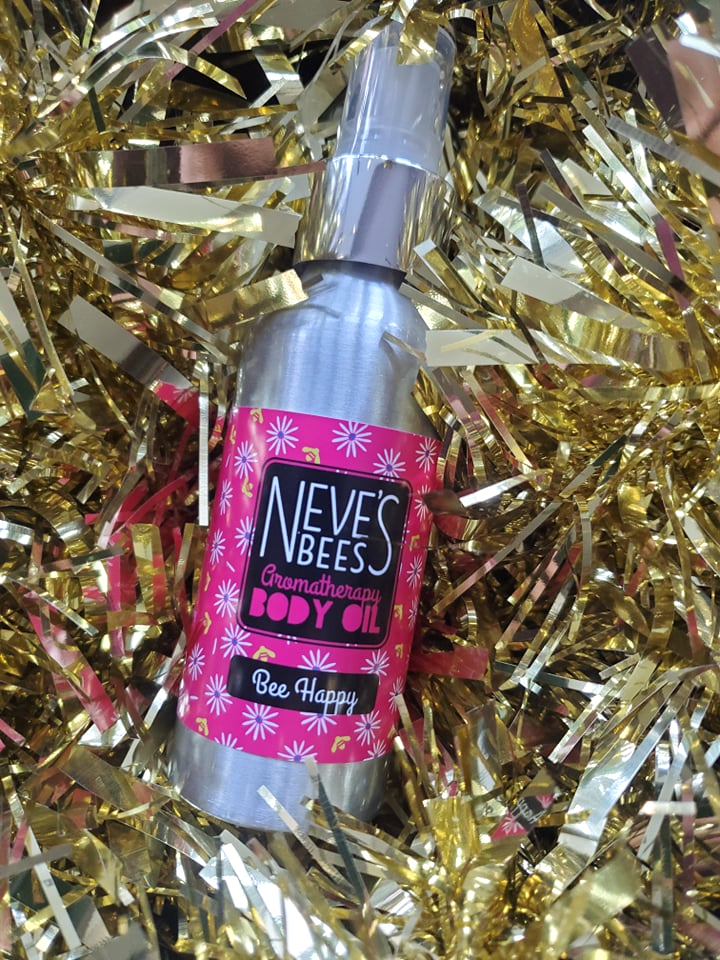 Neve's Bees Bee Happy Body Oil in shiny gold tinsel