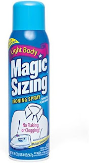 This image shows a can of Magic Sizing spray starch.