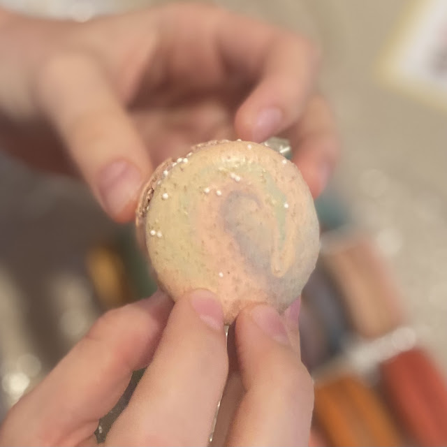 pale colored macaron with a swirl