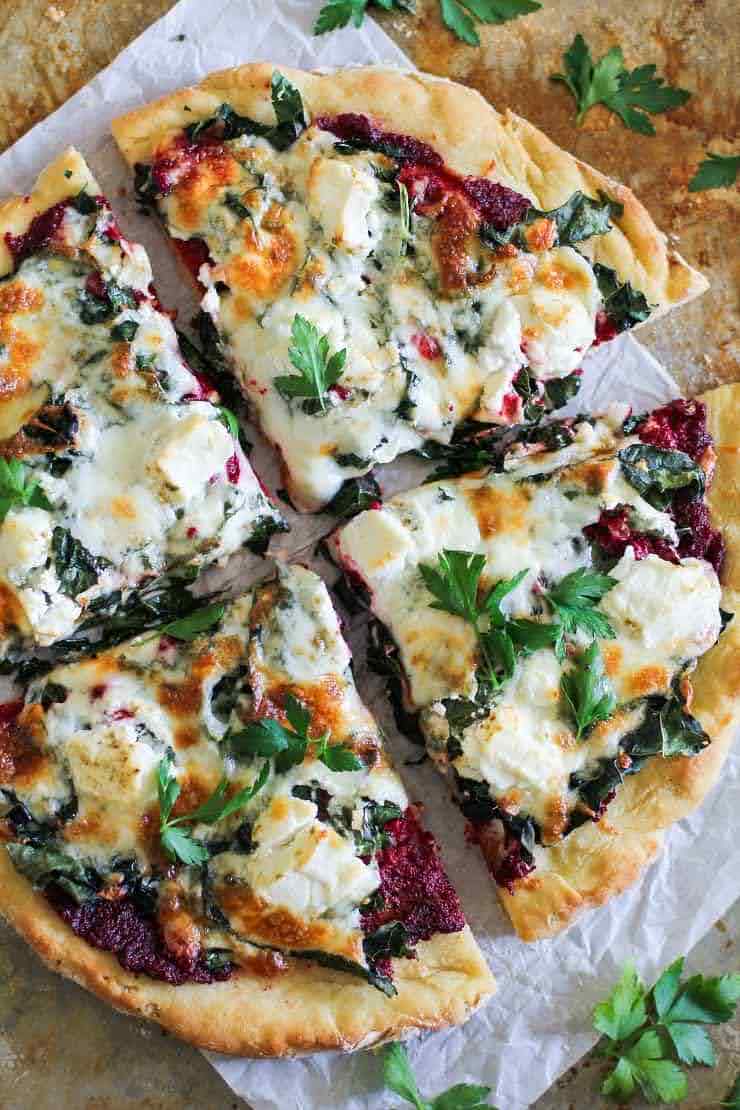 Beet Pesto Pizza with Kale and Goat Cheese | Photo Courtesy of The Roasted Root