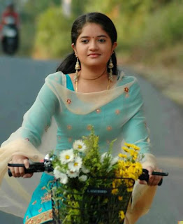 Cute girl riding cycle.