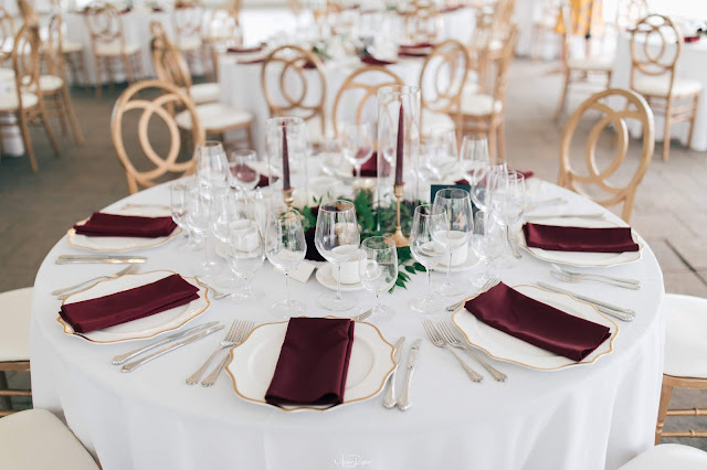 Niagara Wedding Planner - A Divine Affair - Meaghan and Scott - Photo by Marco Roxas Photography. Wedding ceremony and reception at Chateau des Charmes Winery in Niagara on the Lake. Navy Blue and Burgundy colours with Gold accents in the wedding attire and decor. Sweets table on wine barrels by Sweet Bash Co.