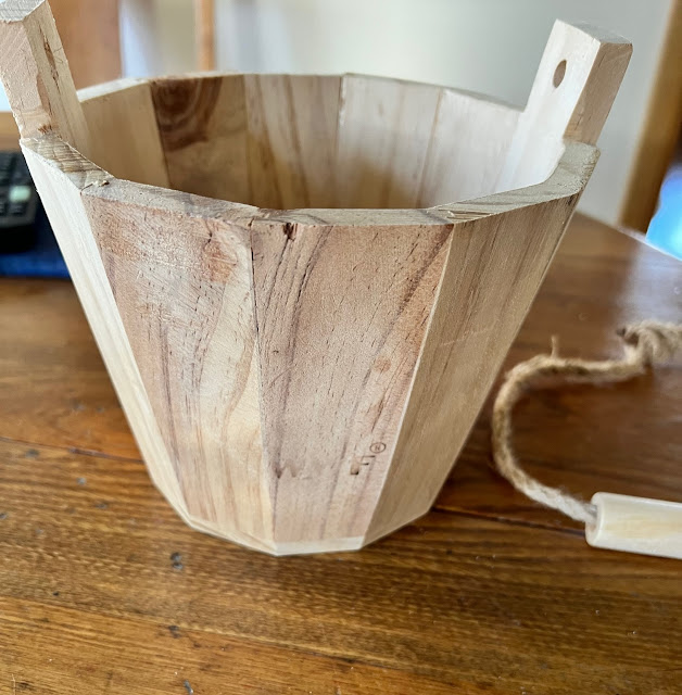 Photo of a thrifted wooden bucket.