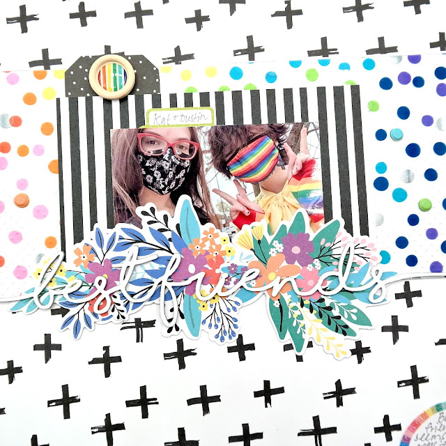 Best friends scrapbook layout with black, white, and rainbow patterned papers and die-cuts and a chipboard title.