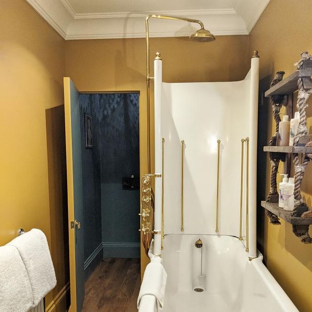 bathtub and shower at portobello hotel