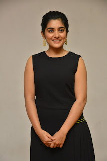 Nivetha Thomas In Black Dress At 118 Movie Interview