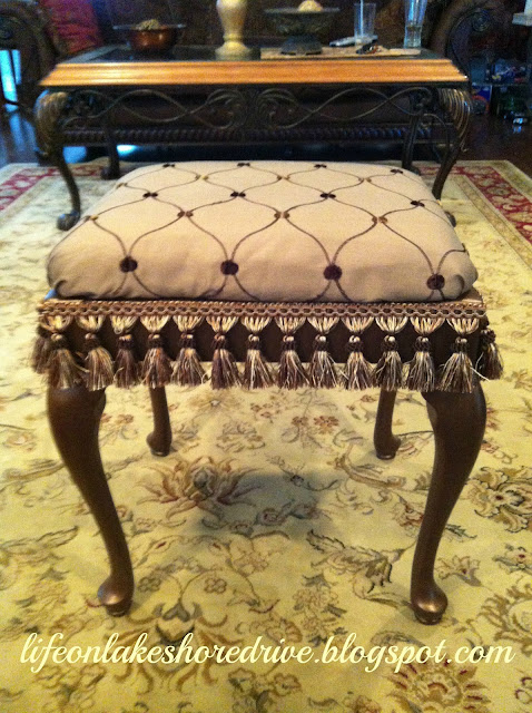 alt="queen anne stool makeover tutorial with martha stewart metallic bronze and fringe"