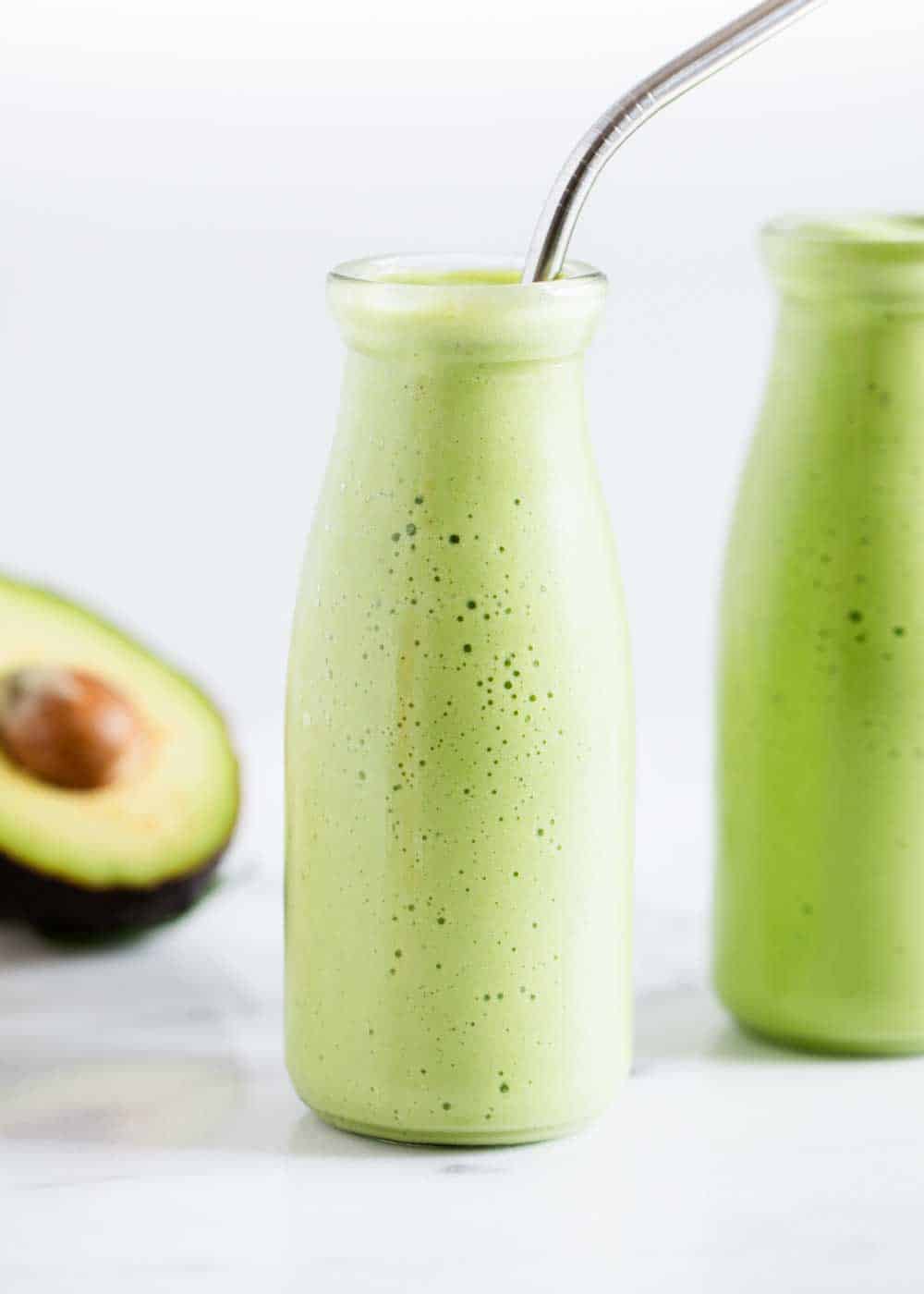 Avocado Smoothie - Thick, creamy and absolutely delicious! Only takes 5 ingredients and 5 minutes to make. The perfect springtime smoothie that's fresh and full of flavor! 