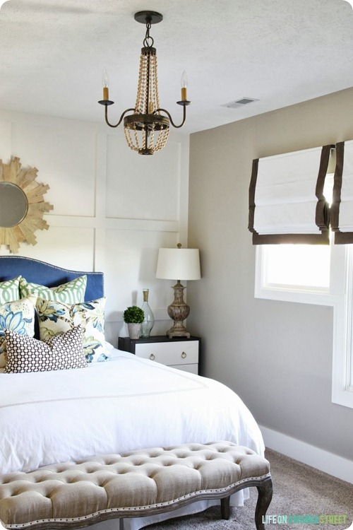 Board and batten wall behind bed
