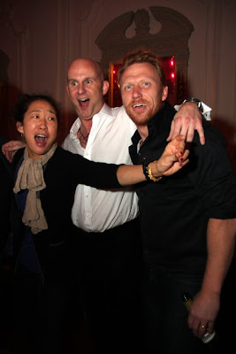 sandra oh and kevin mckidd at a party in london