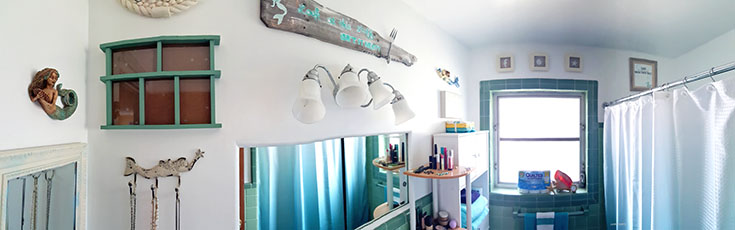 From funky 50's bathroom to a Mermaid Sanctuary, check out my new, beautiful mermaid gallery wall AND learn how to make an awesome DIY mermaid sign!