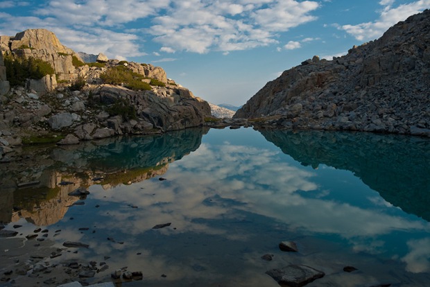 Landscape and Nature photography of a rock reflected on lake