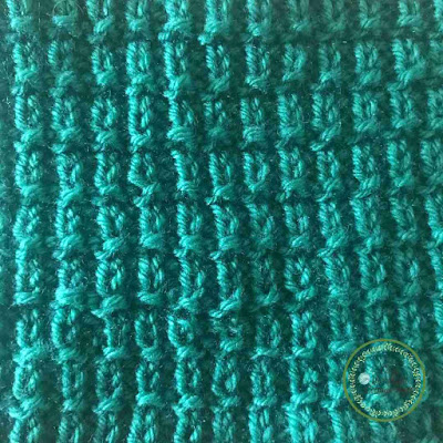 Picture of a close up of the knitted texture of hurdle stitch