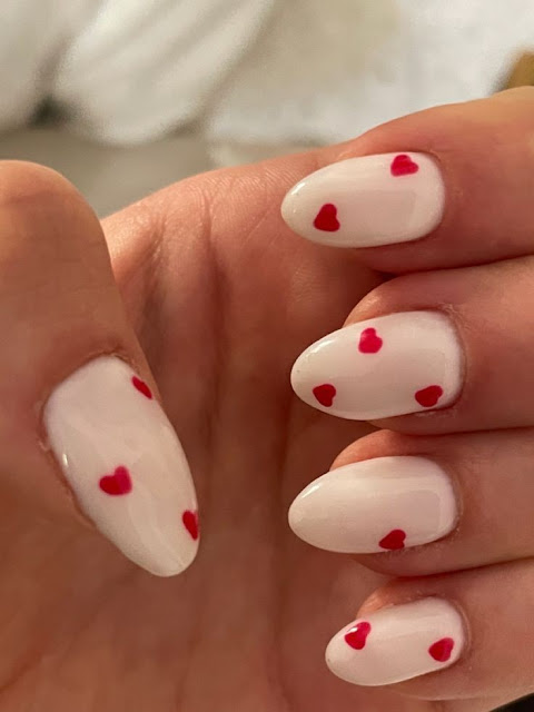 Negative-Space White Heart Nails