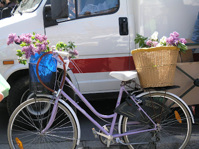 French bicycle lilac carrying lilacs