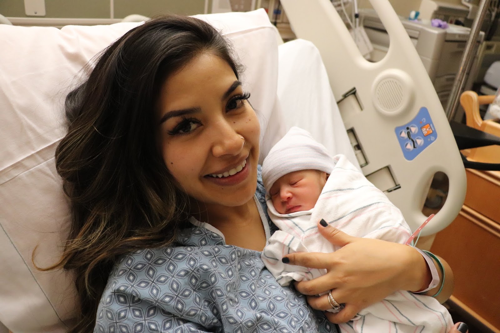 new_mom_with_newborn_baby_after_giving_birth