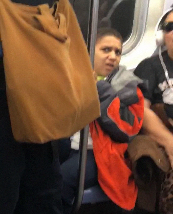 A Boy Refused To Move His Legs On A Subway. His Look When Someone Sat On Them Was Priceless