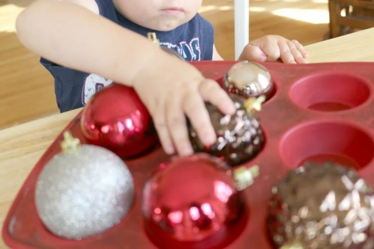 fine motor skills using ornaments