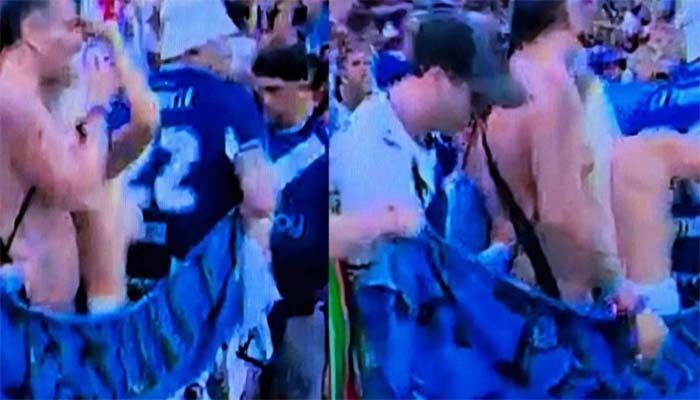 celebrating-topless-by-waving-jerseys-argentina-fan-