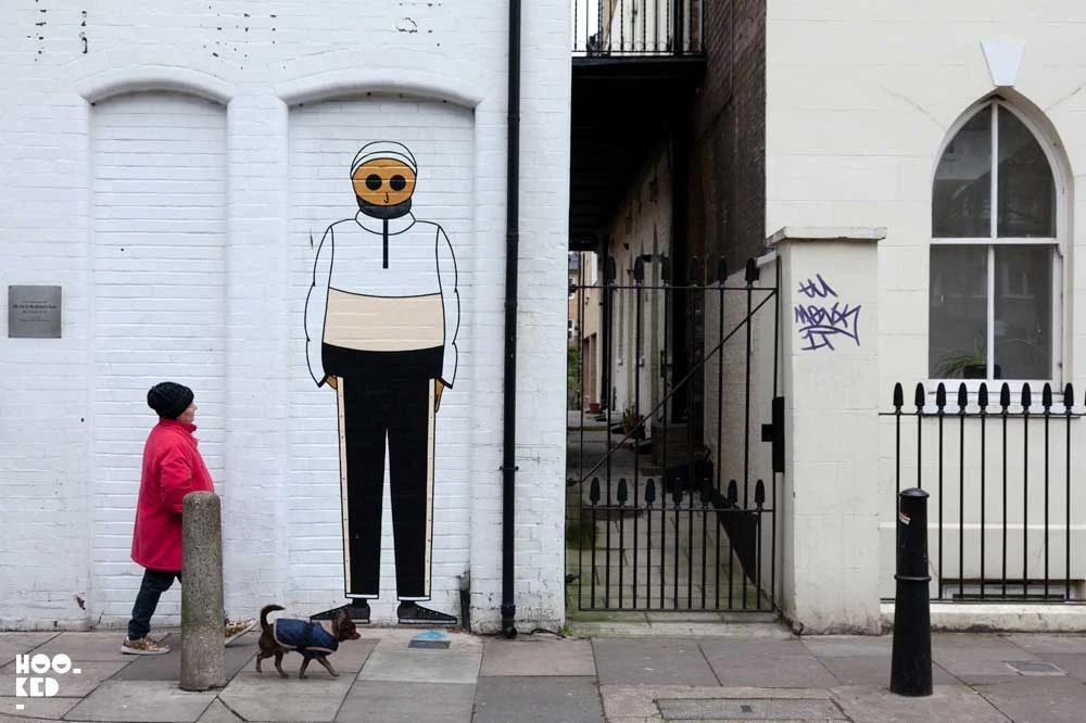 French Street Art Duo Kamlaurene Visit London installing a series of large scale paste-ups in Shoreditch