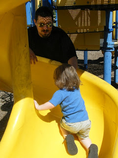 Daddy helping Sasha UP the slide