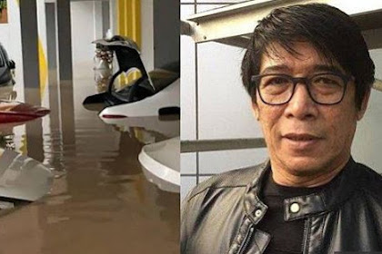 ISTRI PARTO BERSIHKAN LUMPUR BANJIR DENGAN AIR MINUM