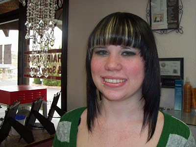 She has blonde under her bold fringe with very dark brown 