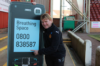 NHS Breathing space helpline mobile phone prop 