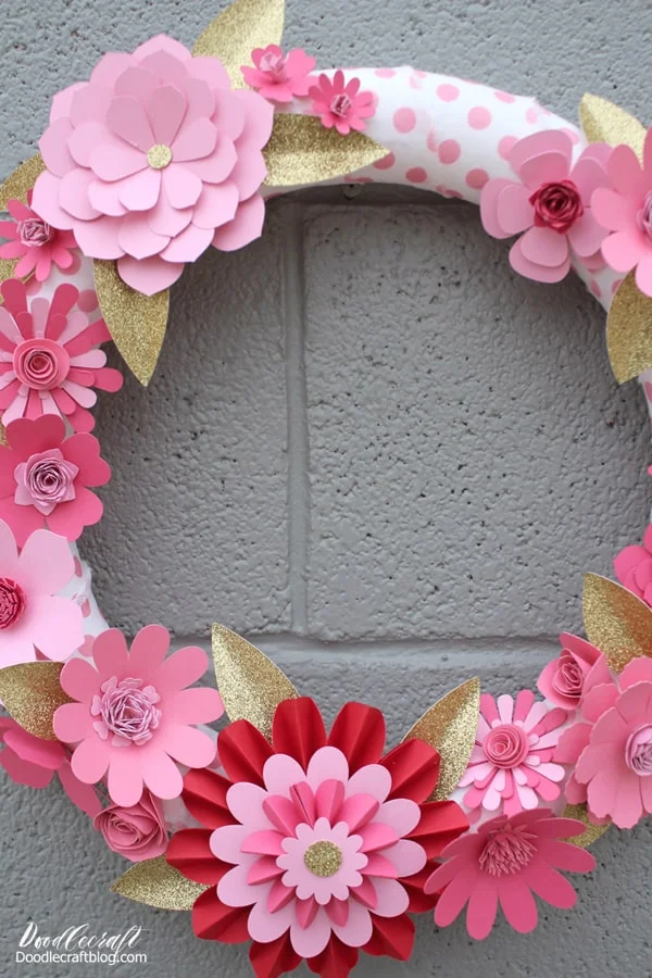 DIY Valentine's Decor Paper Flower Wreath with Cricut Maker   Roses are red, Violets are blue, The Cricut Maker is amazing for Valentine Home Decor too!     I love making flowers out of paper, they are bright and cheery and look beautiful.   Valentine's day decor is so much fun with shades of pink and red...hearts and flowers...and add some sparkly gold for a crowning finish!