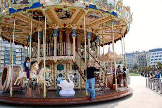 Wayne on Merry Go Round on Paseo Nuevo Promenade San Sebastian